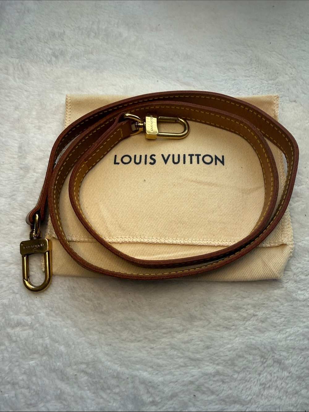 Louis Vuitton Beige Leather Crossbody Strap 
Gold Clasp with dust bag
